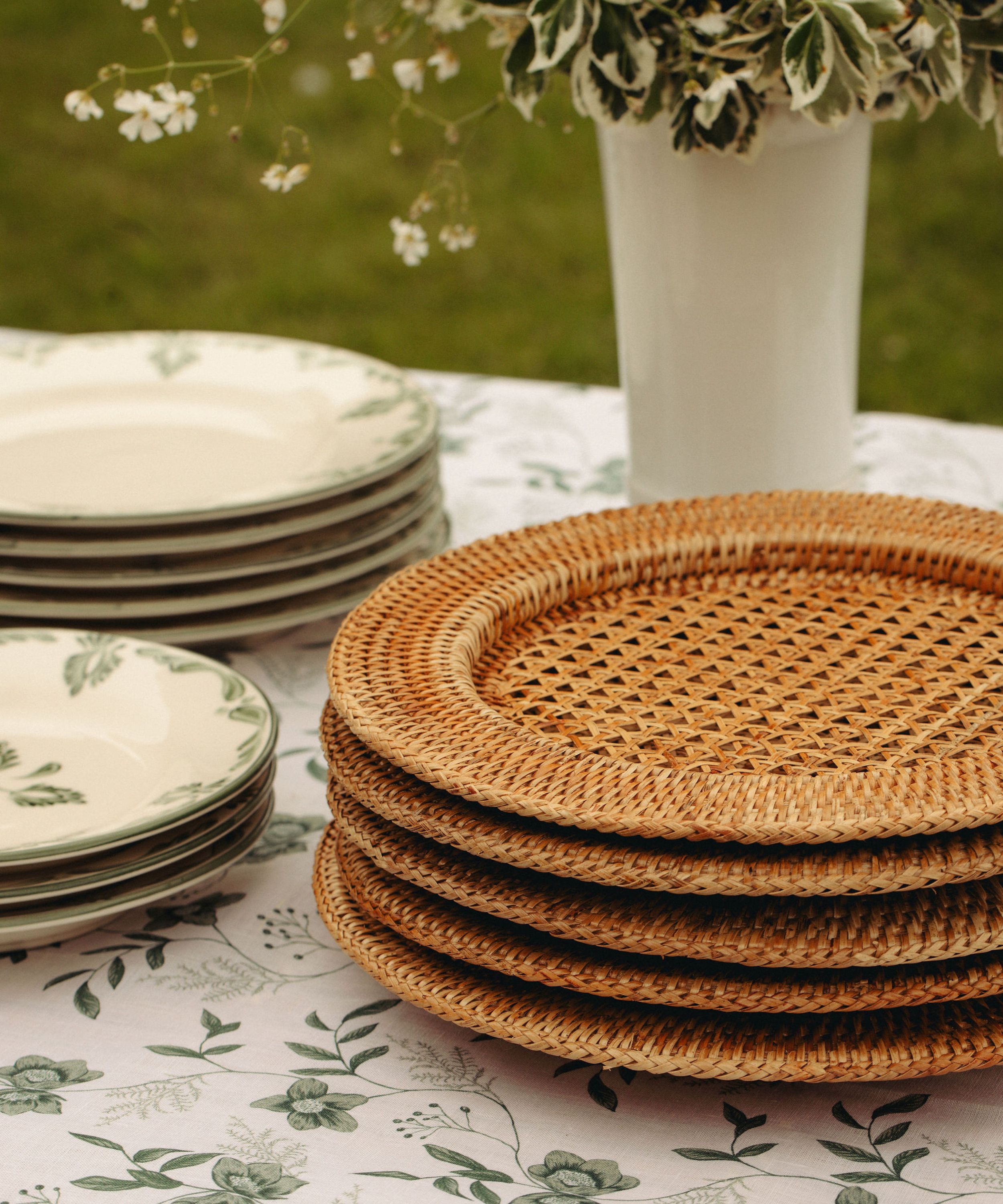 Rebecca Udall Rattan Charger, Natural with the Flora Ceramic Vase