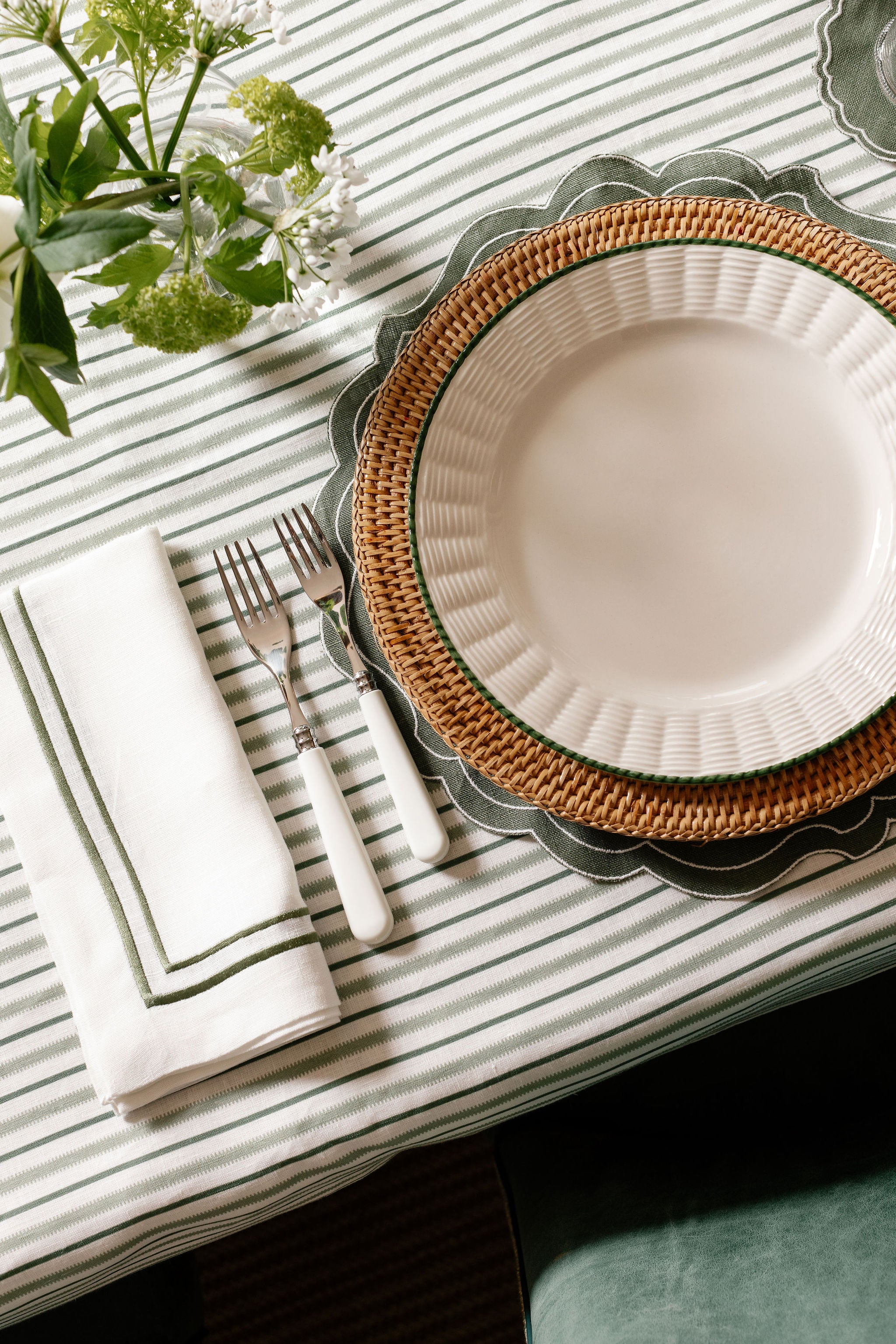 Rebecca Udall Rattan Charger, Natural with the Victoria Tablecloth