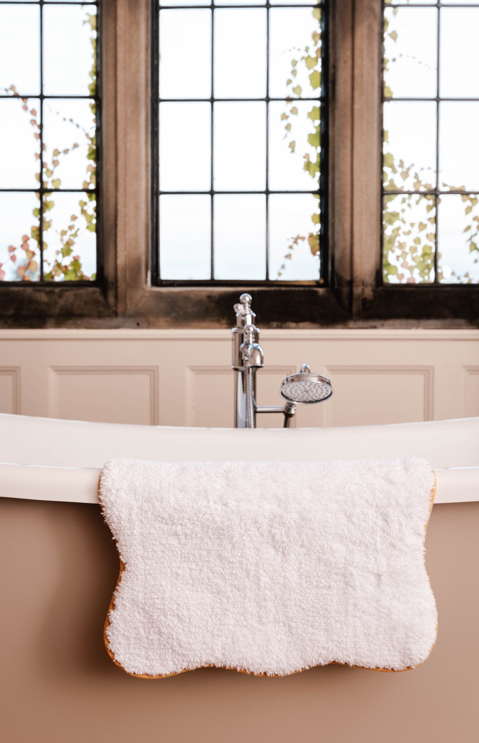 Rebecca Udall scallop bath mat white and mustard yellow gold edge trim