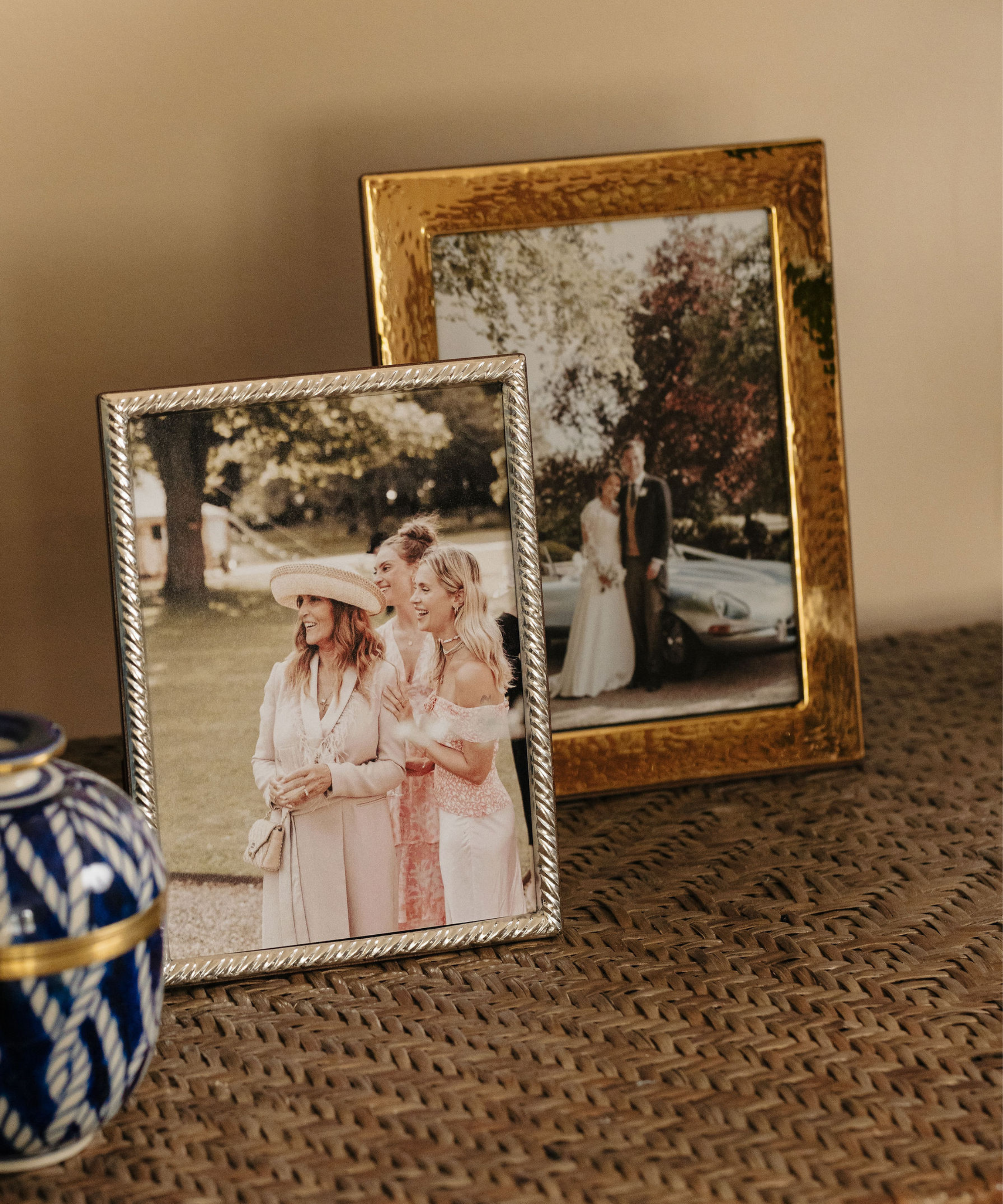 Rebecca Udall Gold Plated Hammered Photo Frame, Displayed on Shelf Next to Sterling Silver Twist Photo Frame.