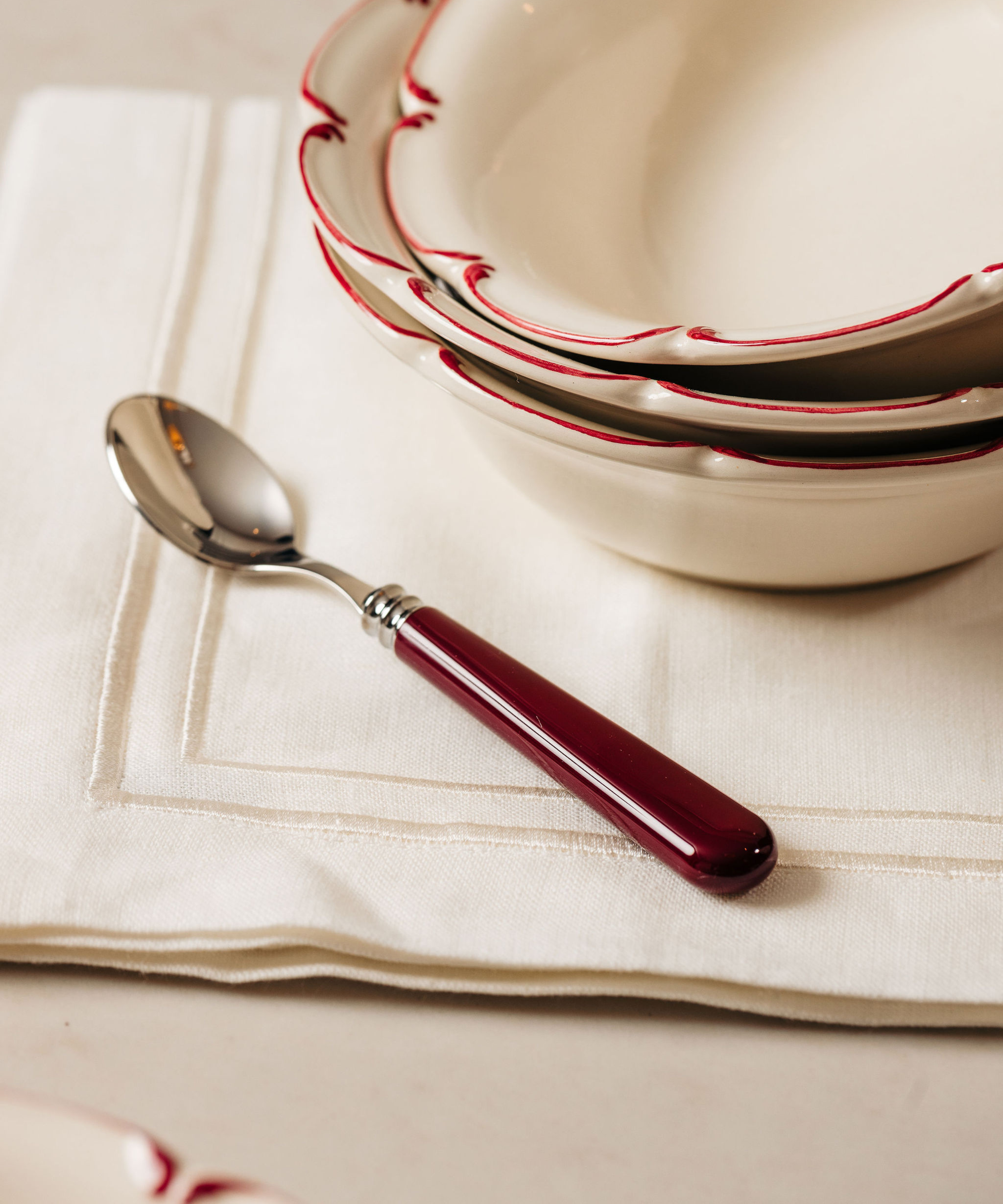 Olivia Scalloped Crockery, Raspberry Filet, with Burgundy Cutlery