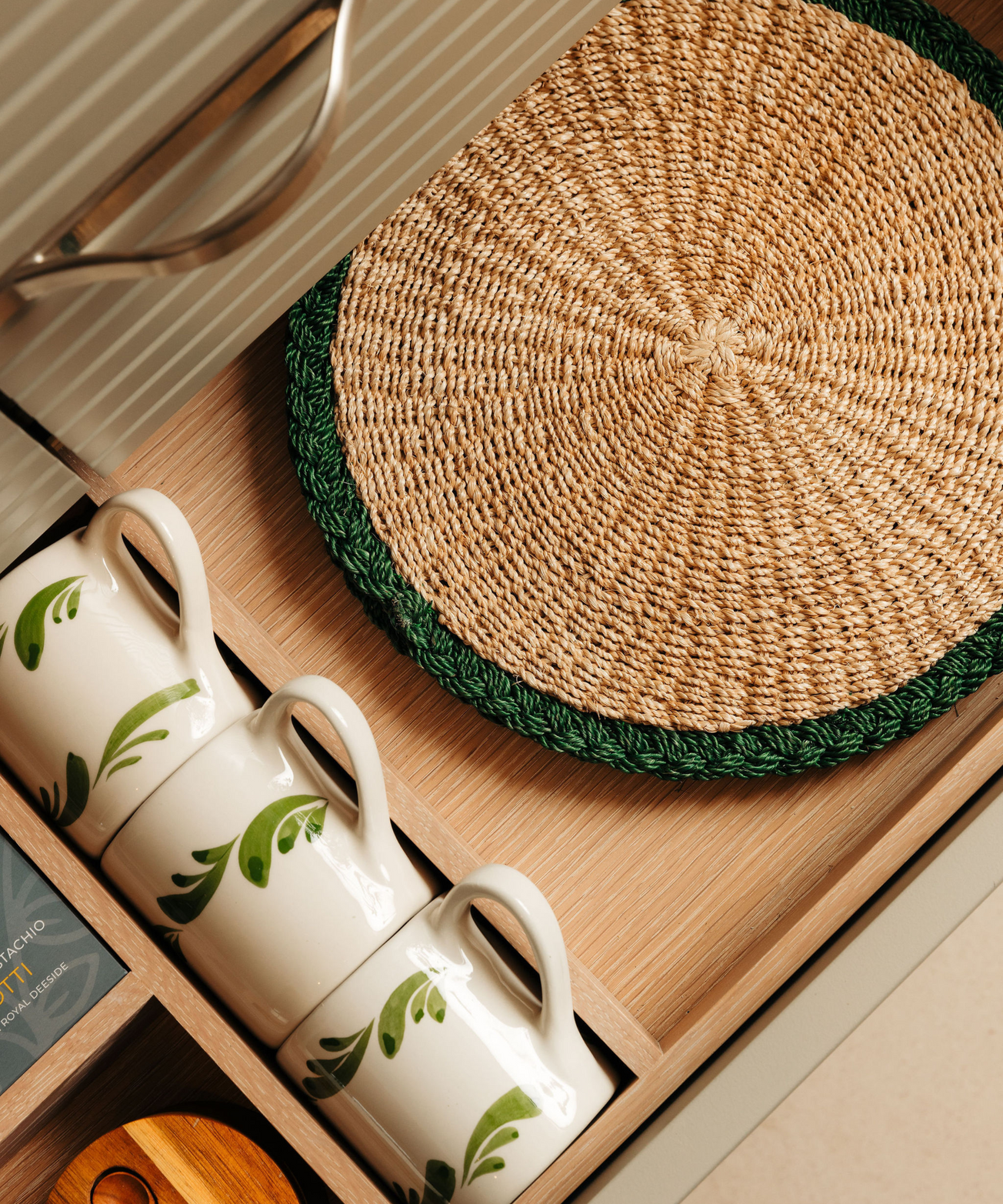 Braided Abaca Placemat, Natural/Juniper, with Celia Mugs