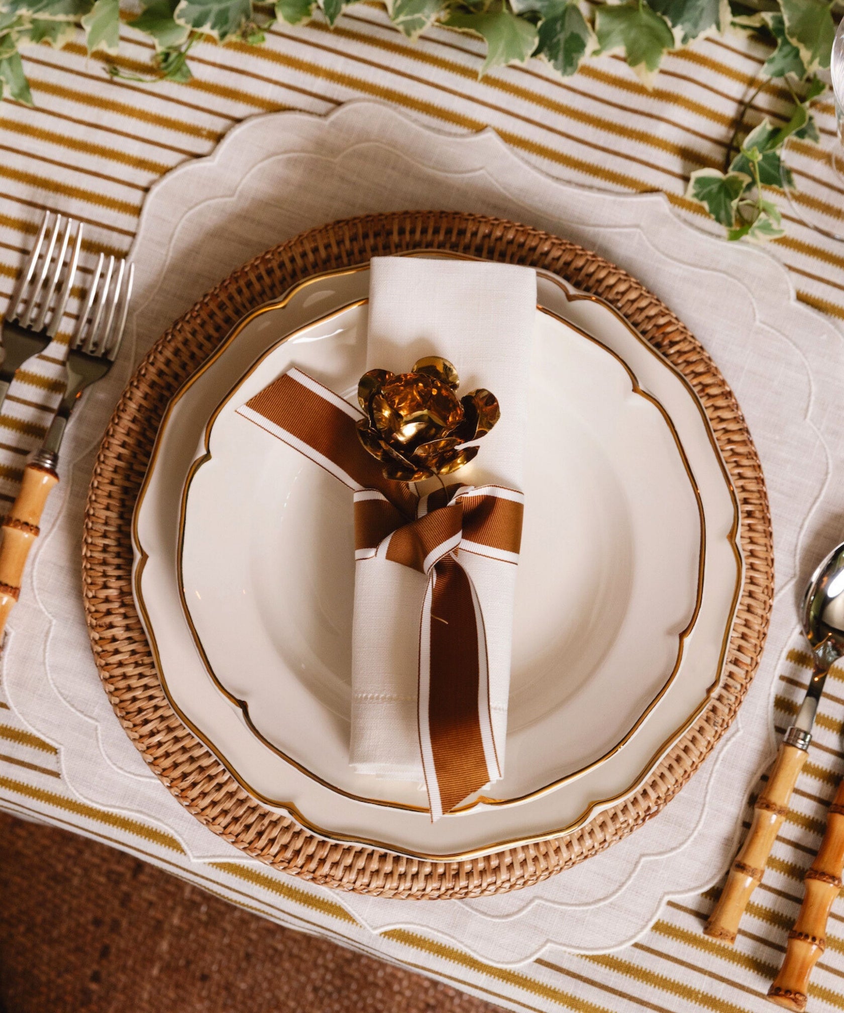 Rebecca Udall Madeleine Gold Border Dinner Plate with the Rattan Charger