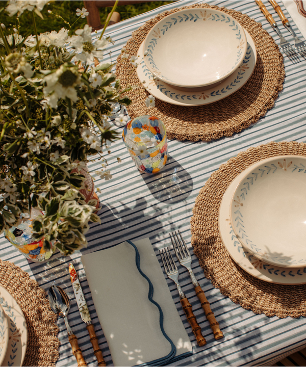 Rebecca Udall Blue Wavy Scalloped Linen Napkin with the Victoria Linen Tablecloth