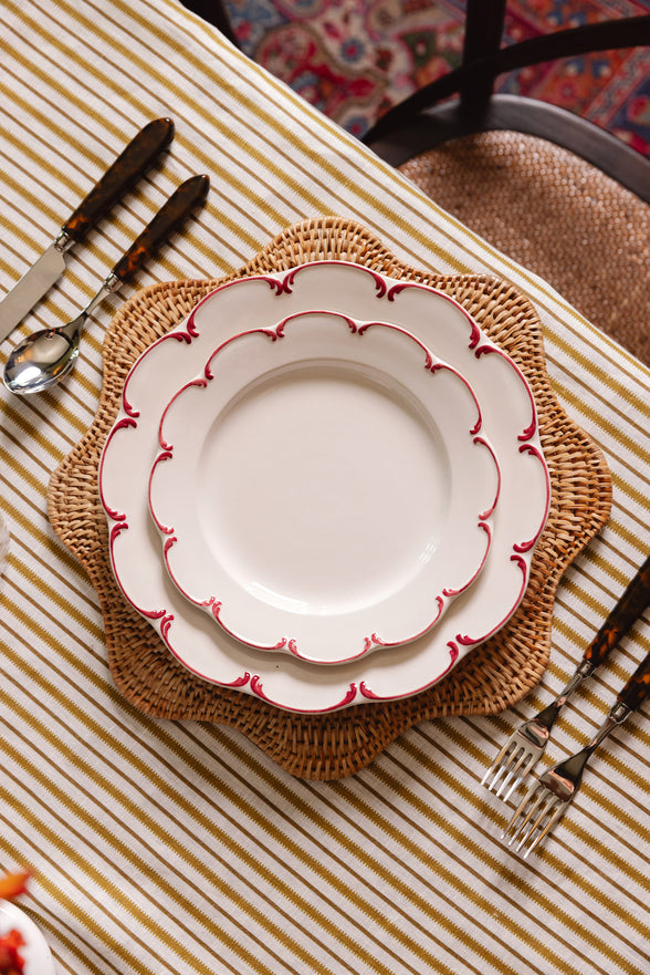 Rebecca Udall scalloped wavy hand woven rattan natural brown placemat with Olivia Crockery