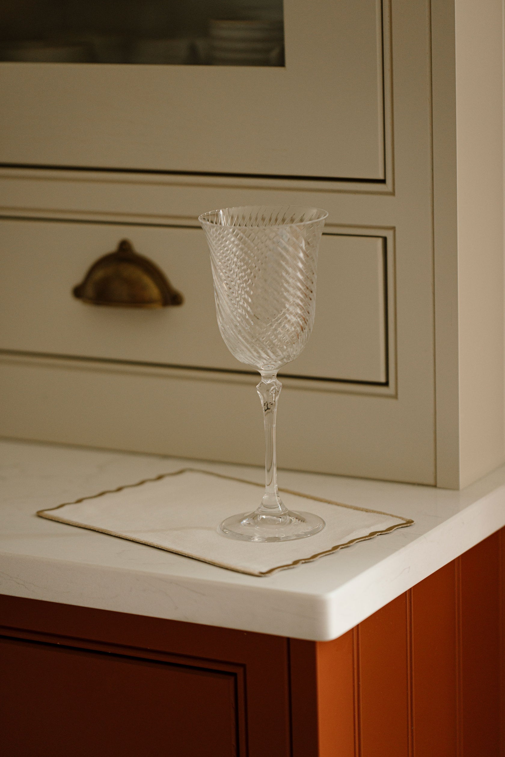 Rebecca Udall Twisted Cut Crystal Red Wine Glass with the Scalloped Linen Napkin