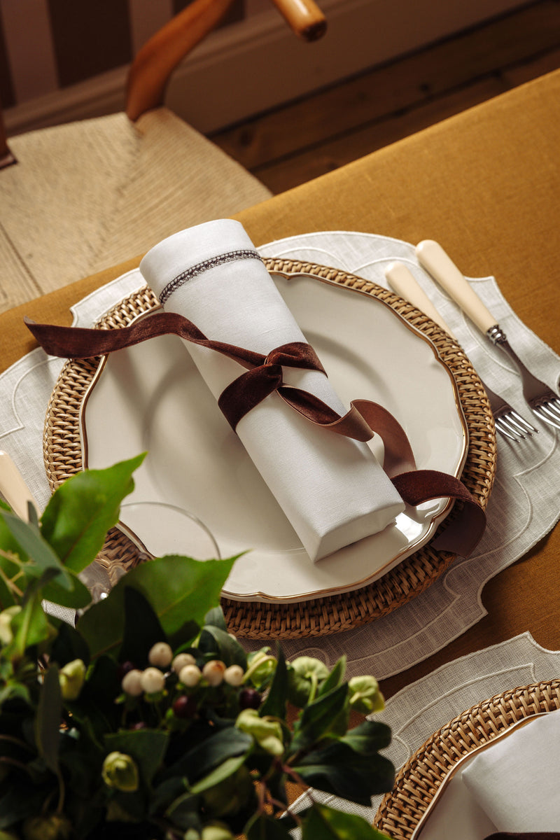 Rebecca Udall Georgiana Ladderstitch Linen Napkin, Chocolate, and Madeleine Dinner Plate, Gold Filet, lifestyle