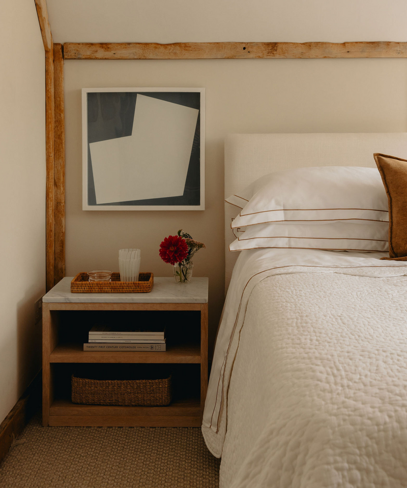 Rebecca Udall Frame Bed Linen, Bronzed Umber with the Rattan Serving Tray in Bedroom 