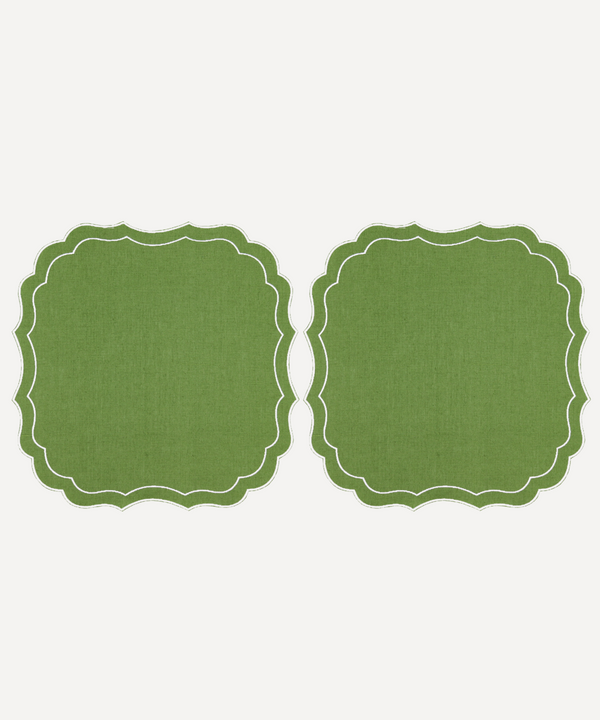 Pair of Stella waxed linen placemats in grass green