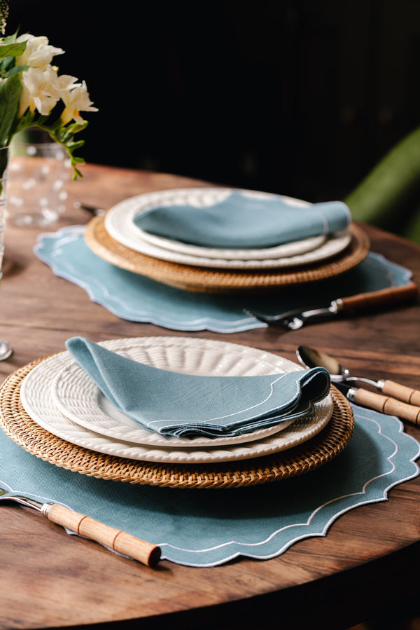 Rebecca Udall Stella Waxed linen with embroidered cotton trim placemat. Tropical Peacock Blue, White