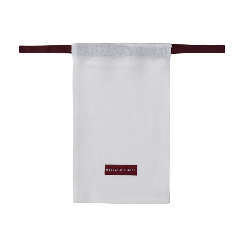 small linen dust bag off white ivory burgundy ribbon luxury gift packaging